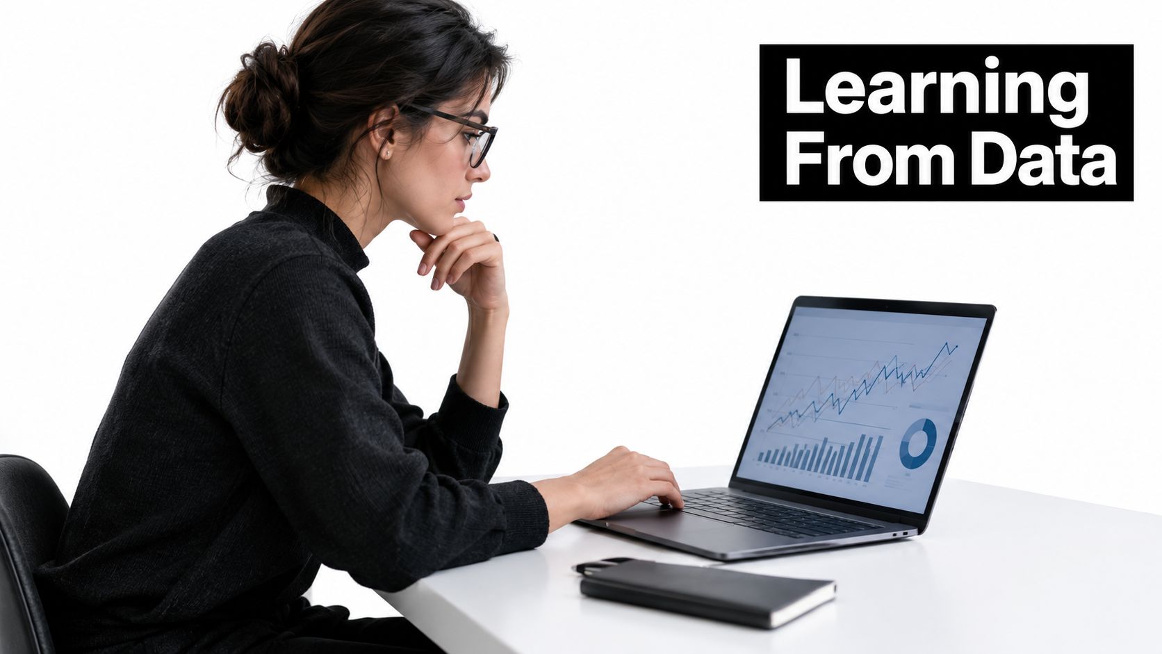 A professional woman in a dark sweater analyzing financial data charts on her laptop computer while working.
