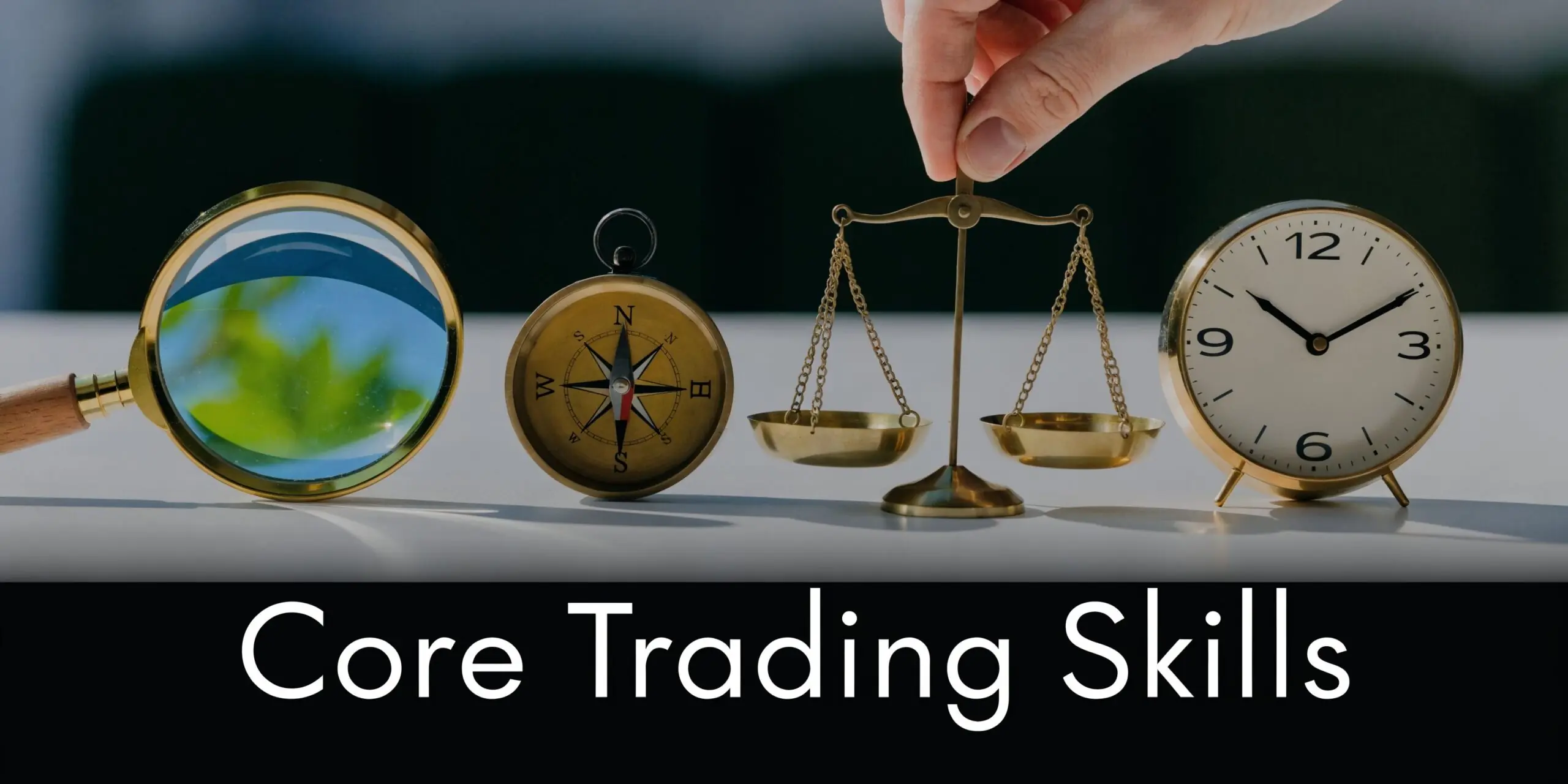 A magnifying glass, compass, scales of justice, and a clock on a table representing core trading skills.